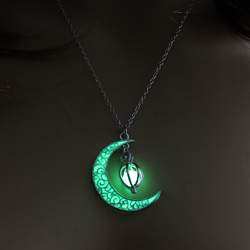 Hollowed-out pumpkin necklace with multi-colored night light moon for Halloween